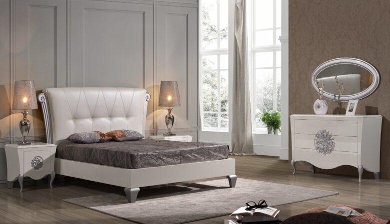 Quarto moderno com cama e cómoda brancas elegantes